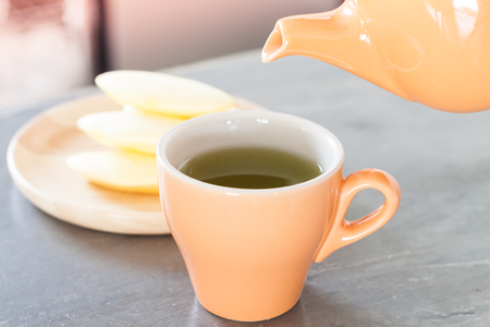 Cup of tea with traditional Thai cookies, stock photoの写真素材