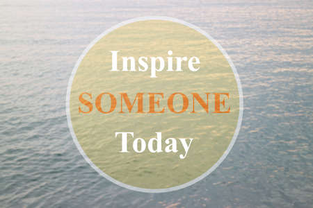 Inspire someone today inspirational quote on deep blue backgroundの写真素材