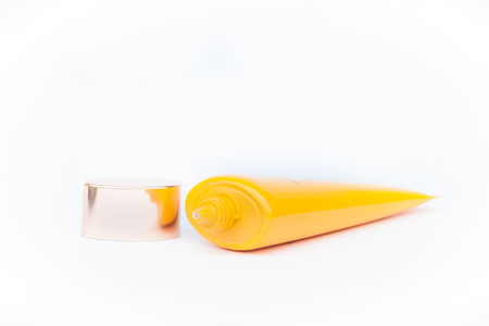 Tube container of sun cream on white backgroundの写真素材