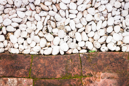 Pebble stones and bricks abstract background, stock photoの写真素材