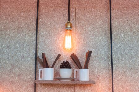 Vintage lighting decorated on brown background, stock photoの写真素材
