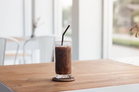 Ice coffee on wooden tableの写真素材