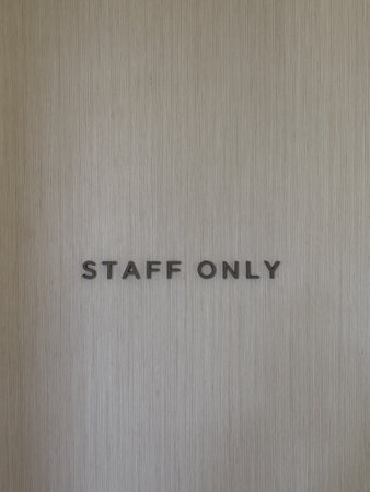 Staff only word on empty wall background, stock photoの写真素材