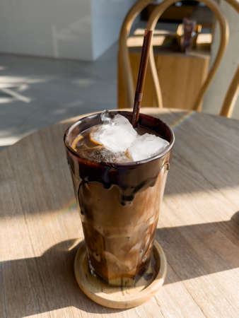 Iced mocha on wooden table, stock photoの写真素材
