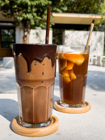 A glass of iced mocha and iced americano with coconut juice, stock photo