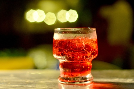 Red cocktail on a glassの写真素材