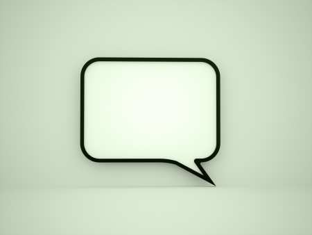 Speech bubble on green backgroundの写真素材