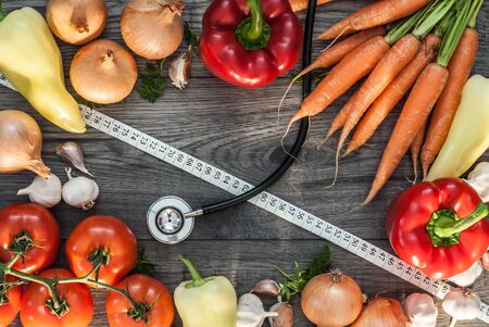 Vegetable mixed fitness concept. Top view vegetable concept on wooden background.の写真素材