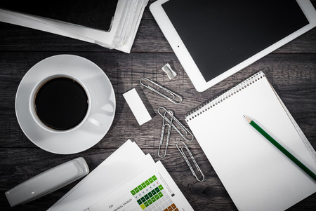 Business workspace concept. Top view. Workplace with tablet and coffee.の写真素材