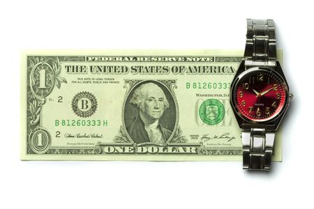 one dollar bill and a watch isolated on white background  の写真素材