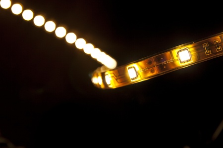 Glowing LED garland on black backgroundの写真素材