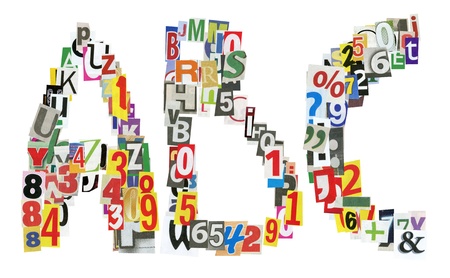 ABC letters made of newspaper letters, numbers and punctuation marks, isolated on whiteの写真素材