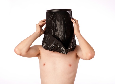 Man with the trash bag on his headの写真素材