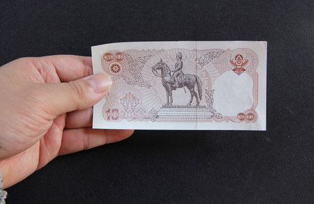 Thai bath money banknote in handの写真素材