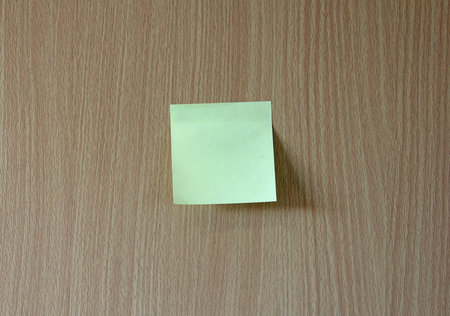 note paper taped on the wall background
