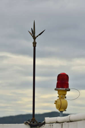 lightning rod and cloudy skyの写真素材