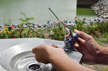 hand washing from water tapの写真素材