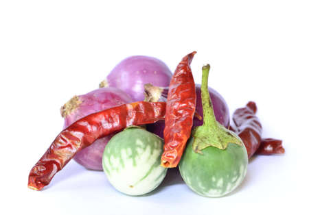 food ingredient red onion,Thai Green Eggplant,dried red pepper on white backgroundの写真素材