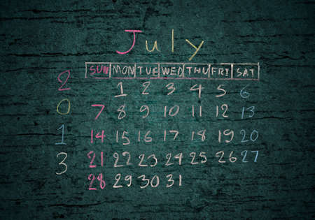 calendar "July 2013" on grunge texture blackgroundの写真素材
