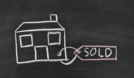 sold house written on blackboardの写真素材
