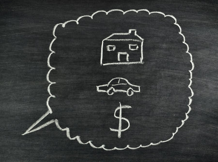 a dreaming of house,car and money drawing on blackboardの写真素材