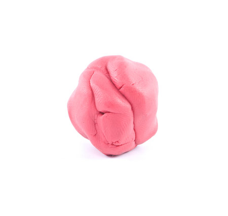 red modeling clay or plasticine on white backgroundの写真素材
