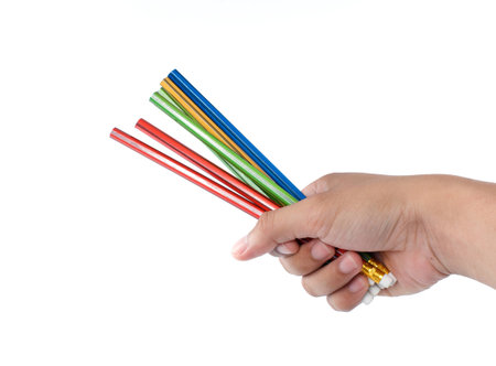 hand holding pencil on white background