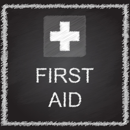 FIRST AID sign on blackboardのイラスト素材