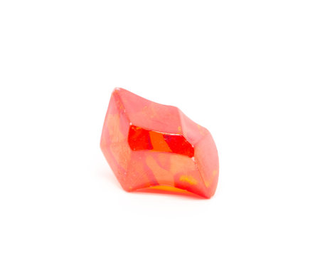 raw red gemstone on white backgroundの写真素材