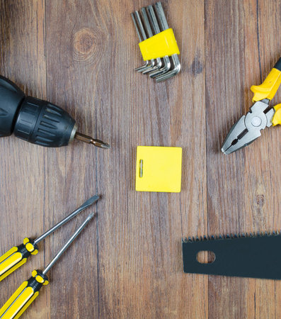 set of hand tools on wooden table,Top viewの写真素材