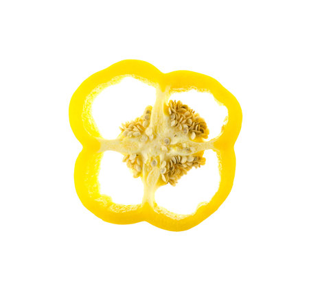 yellow bell pepper slice isolated on whiteの写真素材