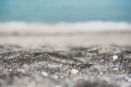 Summer black sand beach backgroundの写真素材