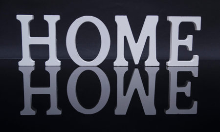 White wood letters , home word