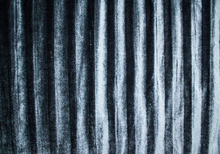 Background and texture of silky pleated velvet fabric in silver color