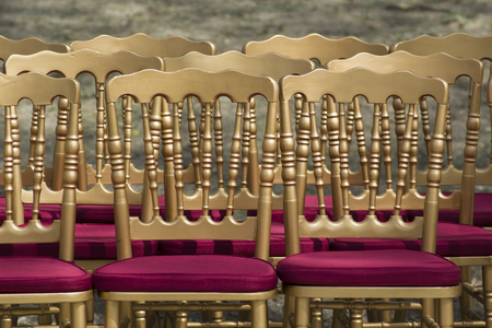 Rows of empty chairs without audience. Retro style chairs backgroundの写真素材