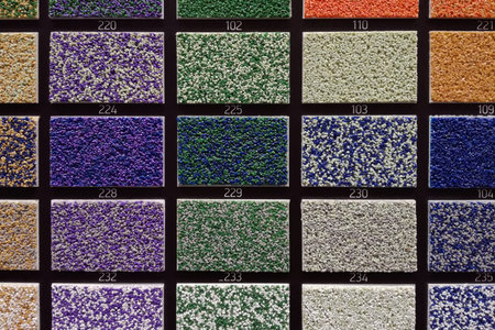 Multi-colored samples of plasterboard for interior decoration in the store of building materials...