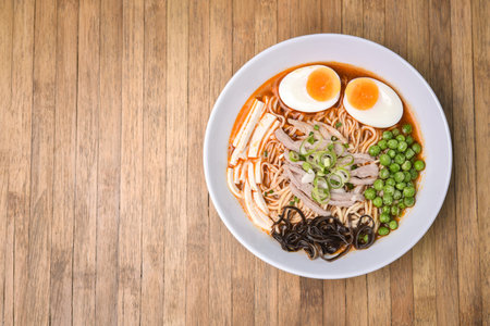 Spicy Tom Yum, Creamy Pork Ramen with Egg, Sugar Pea, Tofu and Mushroom