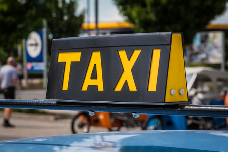 Old TAXI signの写真素材