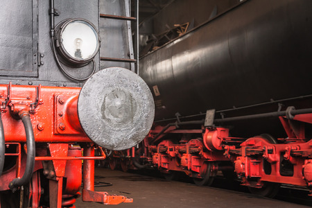 Old steam locomotive in a round houseのeditorial素材