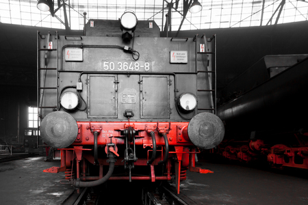 Old steam locomotive in a round houseのeditorial素材