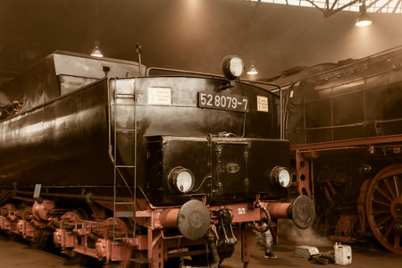 Old vintage steam locomotive in a depot