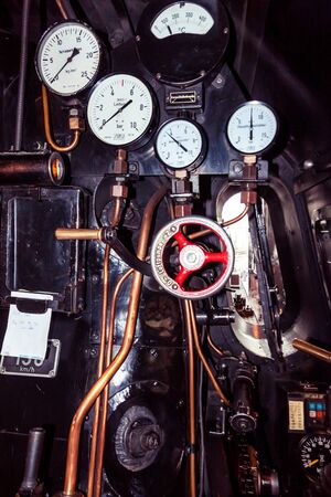 Cockpit of an old steam locomotiveの写真素材