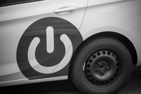 Electric switch sign on a carの写真素材