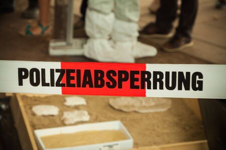 Police boundary line in Germany to secure a investigationの写真素材