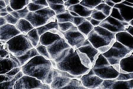 The moving water of a pool as backgroundの写真素材