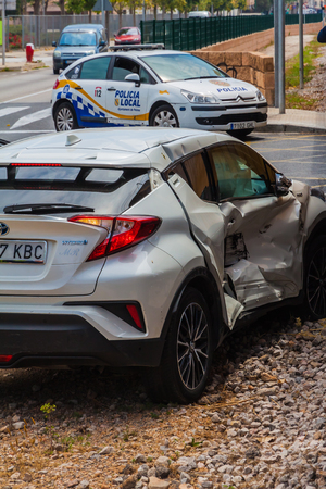 Damaged car after accident with a train in Majorcaのeditorial素材