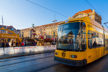 A tram in front of the christmas market in Dresden, Saxonyのeditorial素材