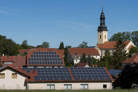 Solar panels on a roof of a houseの写真素材