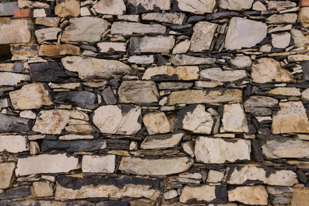 Background of stone wall texture. Old stone wall texture for design.の写真素材