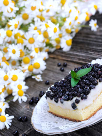 Homemade blueberry cake with fresh fruits on plate の写真素材